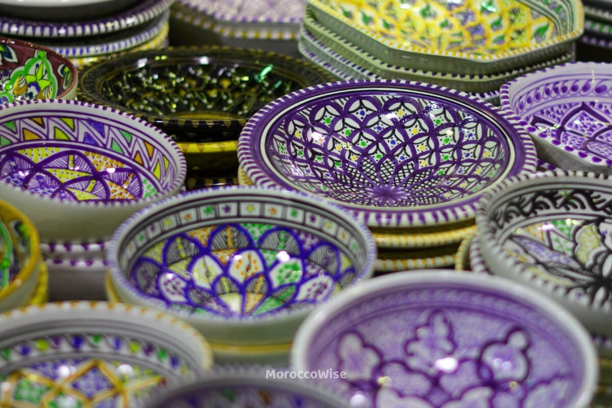 Traditional Meknes artisans shaping decorative metalwork